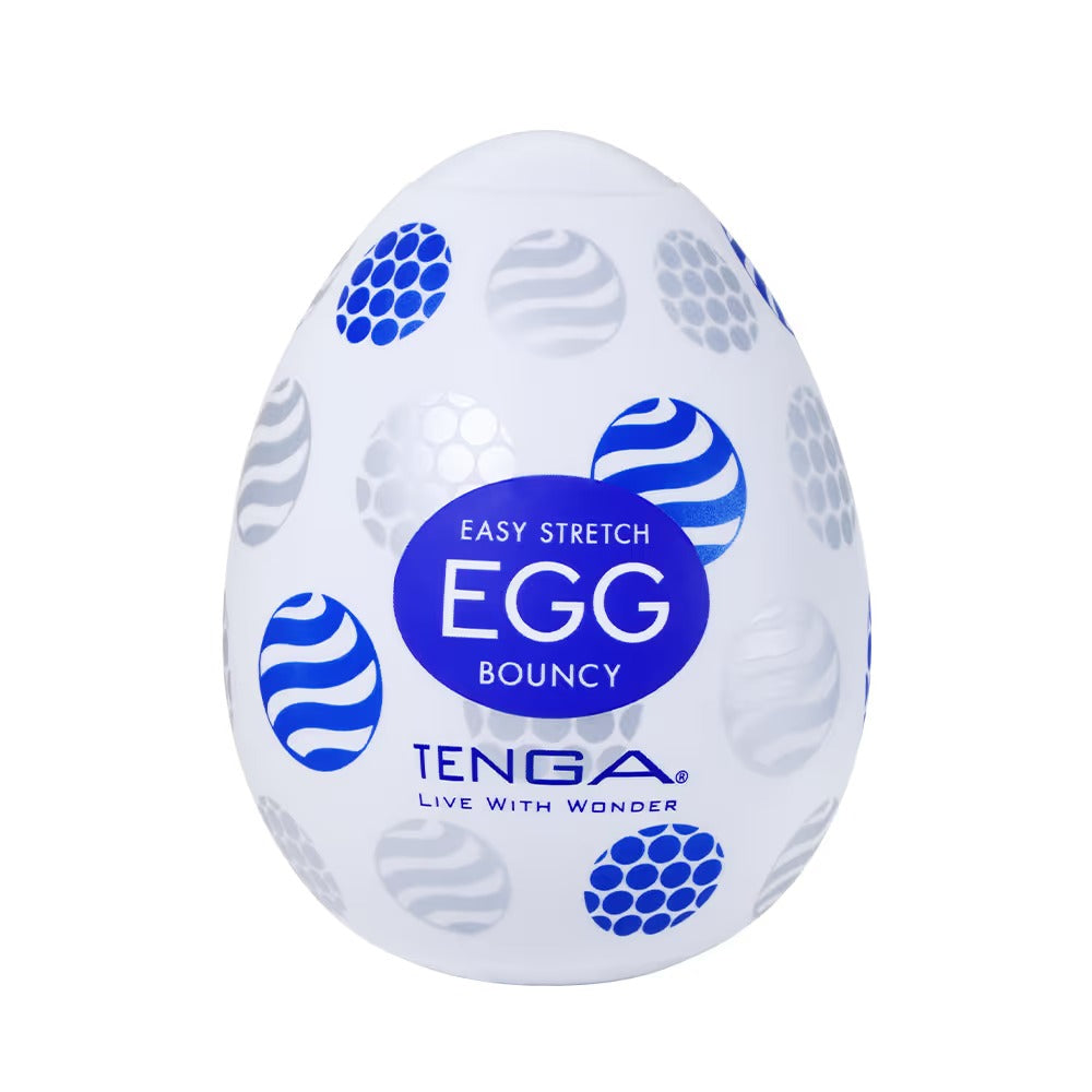 TENGA EGG BOUNCY 飛機蛋包裝正面圖,白色蛋形外殼配藍色圓球與波浪紋設計,產品名稱清晰可見。