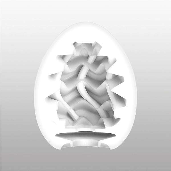 TENGA EGG WAVY II 的蛋型剖面示意圖,內部交錯波浪紋理展現深層刺激與高彈性設計。