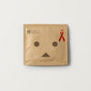岡本 Okamoto 紙箱人 Danboard 特別版安全套 單片 Condom 包裝設計，帶有紅絲帶標誌